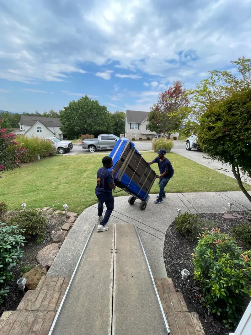 Chattanooga local movers from New Journey Moving loading furniture during a residential move
